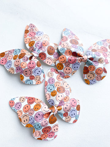 Smiley Face Butterfly Clip